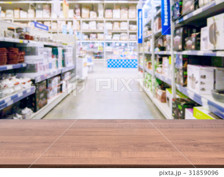 Empty table in front of blurred background Empty table in front of blurred background 31859096