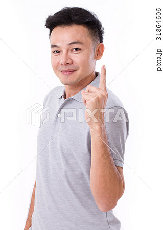 happy, smiling man giving no.1 hand gesture happy, smiling man giving no.1 hand gesture 31864606