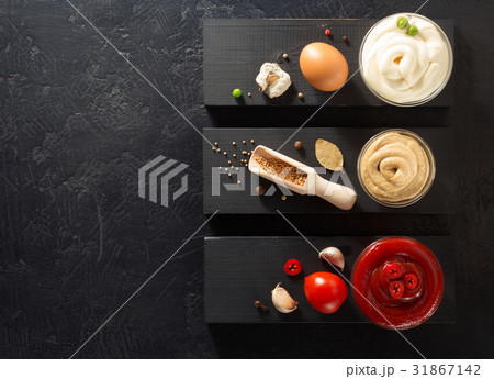 tomato sauce, mayonnaise and mustard in bowl 31867142