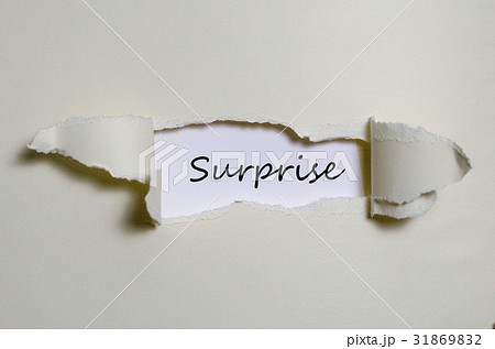 The word surprise appearing behind torn paper The word surprise appearing behind torn paper 31869832