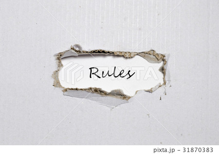 The word rules appearing behind torn paper The word rules appearing behind torn paper 31870383