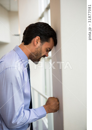 Stressed businessman at conference centre 31877081