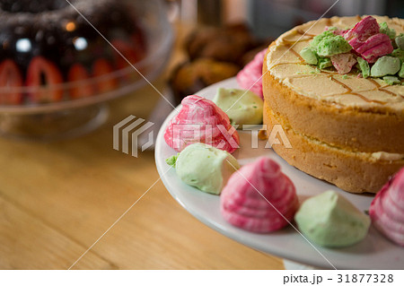 Cake served on plate in coffee house Cake served on plate in coffee house 31877328