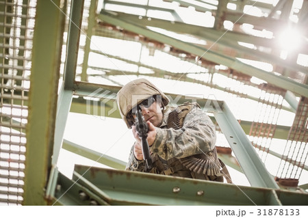 Military soldier guarding with a rifle 31878133