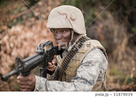 Military soldiers during training exercise with weapon Military soldiers during training exercise with weapon 31879039