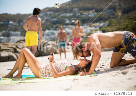 Romantic young couple at beach Romantic young couple at beach 31879513