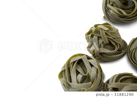 Overhead view of green tagliatelle Overhead view of green tagliatelle 31881290