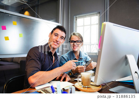 Business partners working together in desktop 31886135