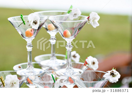 Champagne tower ready to spill alcohol 31886371