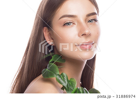 Beautiful young girl with a light natural make-up Beautiful young girl with a light natural make-up 31886974