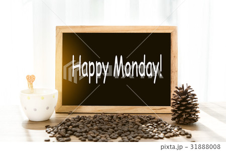Happy Monday message on blackboard with coffee Happy Monday message on blackboard with coffee 31888008