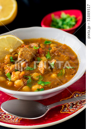Moroccan soup harira with meat, chickpeas, lentils Moroccan soup harira with meat, chickpeas, lentils 31889317