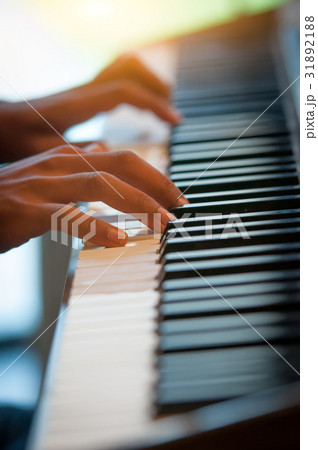 Pianist hands on the keyboard 31892188