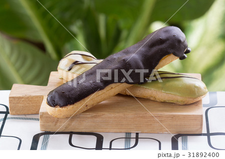 Green Tea and chocolate coating Eclair 31892400