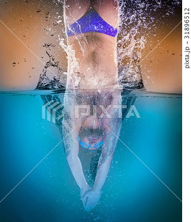 professional swimmer underwater after the jump 31896512