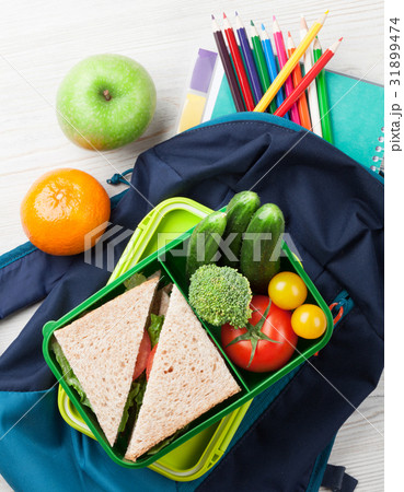 Lunch box and school supplies 31899474