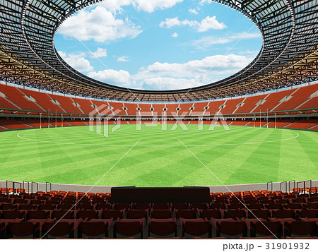 Australian rules football arena with orange seats Australian rules football arena with orange seats 31901932