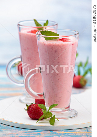 Different  milkshakes on the table. 31902975