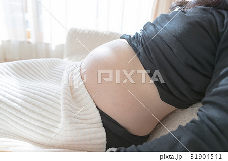 woman during pregnancy or shortly after childbirth 31904541