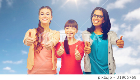 international happy women showing thumbs up 31905769