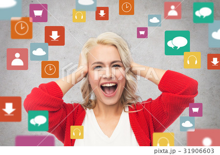 happy young woman holding her head and laughing 31906603