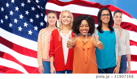 international american women showing thumbs up international american women showing thumbs up 31907168