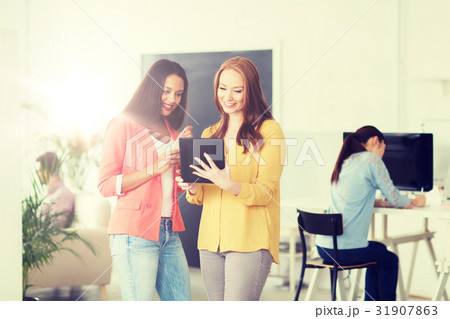 creative team with table pc in office creative team with table pc in office 31907863