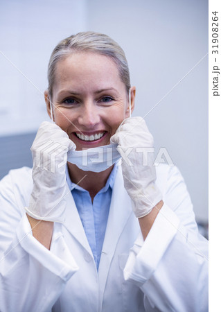 Portrait of female dentist smiling Portrait of female dentist smiling 31908264