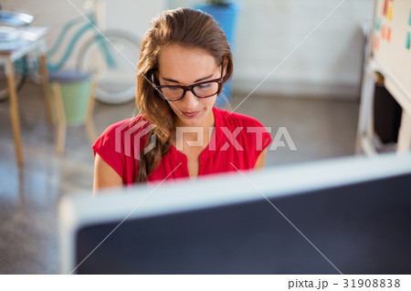 Graphic designer working on computer Graphic designer working on computer 31908838