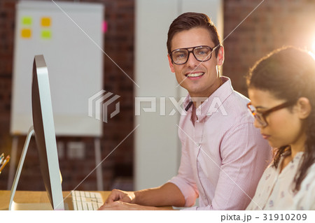 Man working on computer Man working on computer 31910209