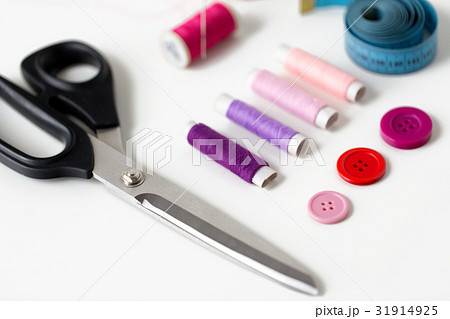 scissors, sewing buttons, threads and tape measure scissors, sewing buttons, threads and tape measure 31914925