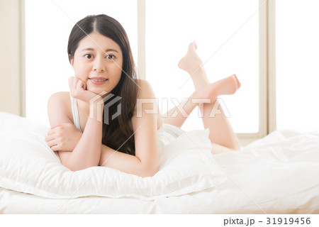 asian woman smile face to camera in the morning asian woman smile face to camera in the morning 31919456