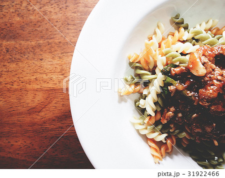 The picture of fusilli and bolognese sauce. 31922466