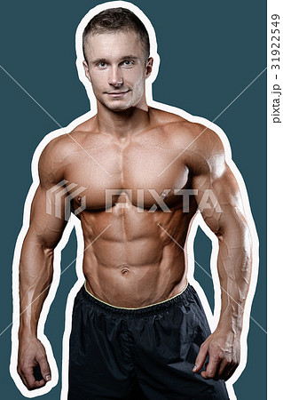Caucasian sexy fitness model in gym close up abs. Caucasian sexy fitness model in gym close up abs. 31922549