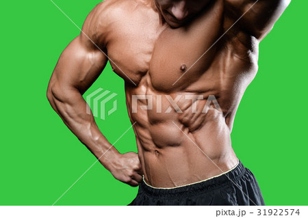Caucasian sexy fitness model in gym close up abs. 31922574