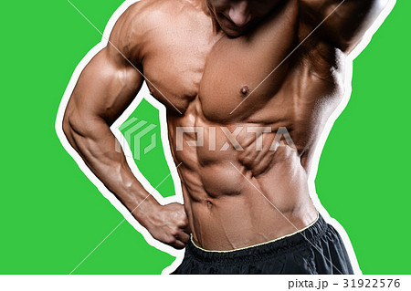 Caucasian sexy fitness model in gym close up abs. 31922576