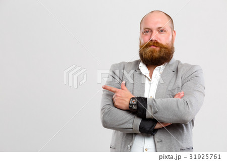 Man points finger to side 31925761