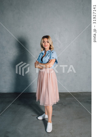 Happy young woman in casual clothes, smiling 31927141