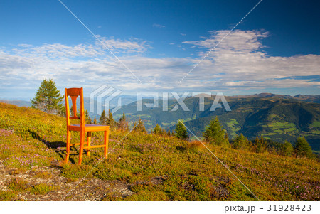Old wooden chair on the top in Gerlitzen Apls 31928423