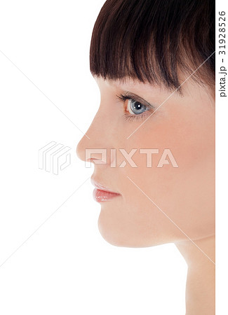 Profile of pretty woman face over white 31928526