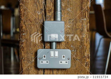 plug socket distributes power to all electric 31933734