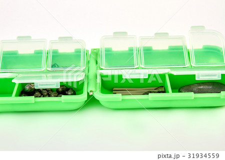 Closeup of opened fishing container. 31934559