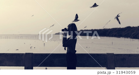 Woman Taking Snap Photo with Camera Wanderlust 31943059