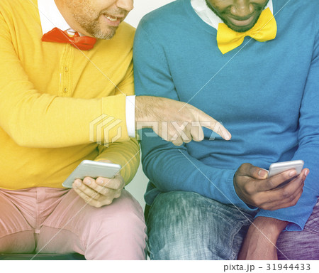 Men sitting and having fun 31944433