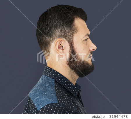 Man standing and posing for photoshoot Man standing and posing for photoshoot 31944478