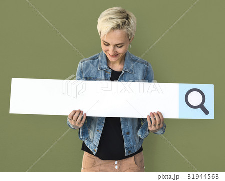 Caucasian Woman Holding Searching Sign Smiling Caucasian Woman Holding Searching Sign Smiling 31944563