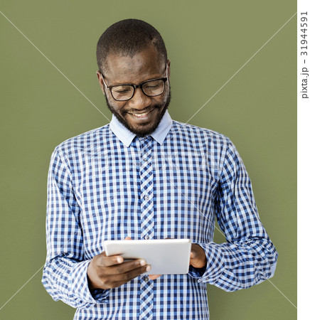 African Adult Man Using Digital Tablet Studio 31944591