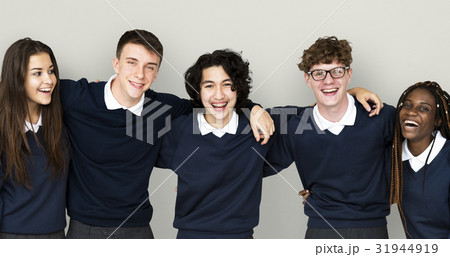 Diverse Group Of Students Standing in a row Diverse Group Of Students Standing in a row 31944919