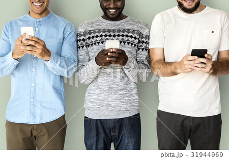 Happiness group of men smiling and conneted by mobile phone Happiness group of men smiling and conneted by mobile phone 31944969