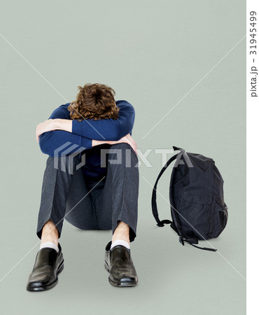 Student young man stressed unhappy failed alone Student young man stressed unhappy failed alone 31945499